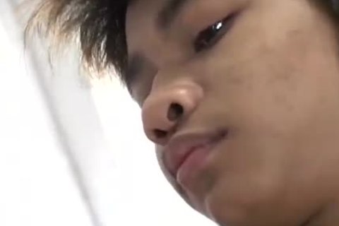 Two asian dudes Play With Each Others dicks